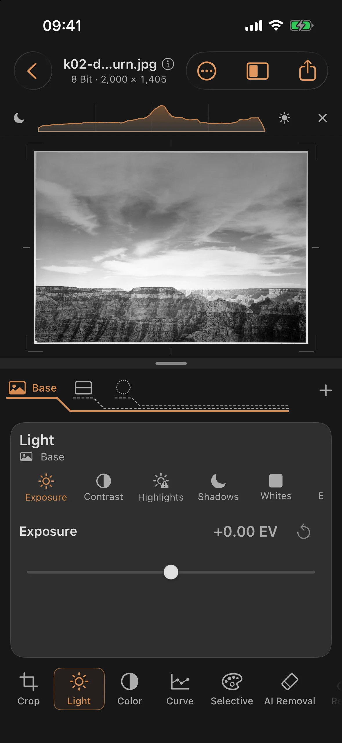 Finished image with the sky burned in, the canyon wall dodged, and the black point set